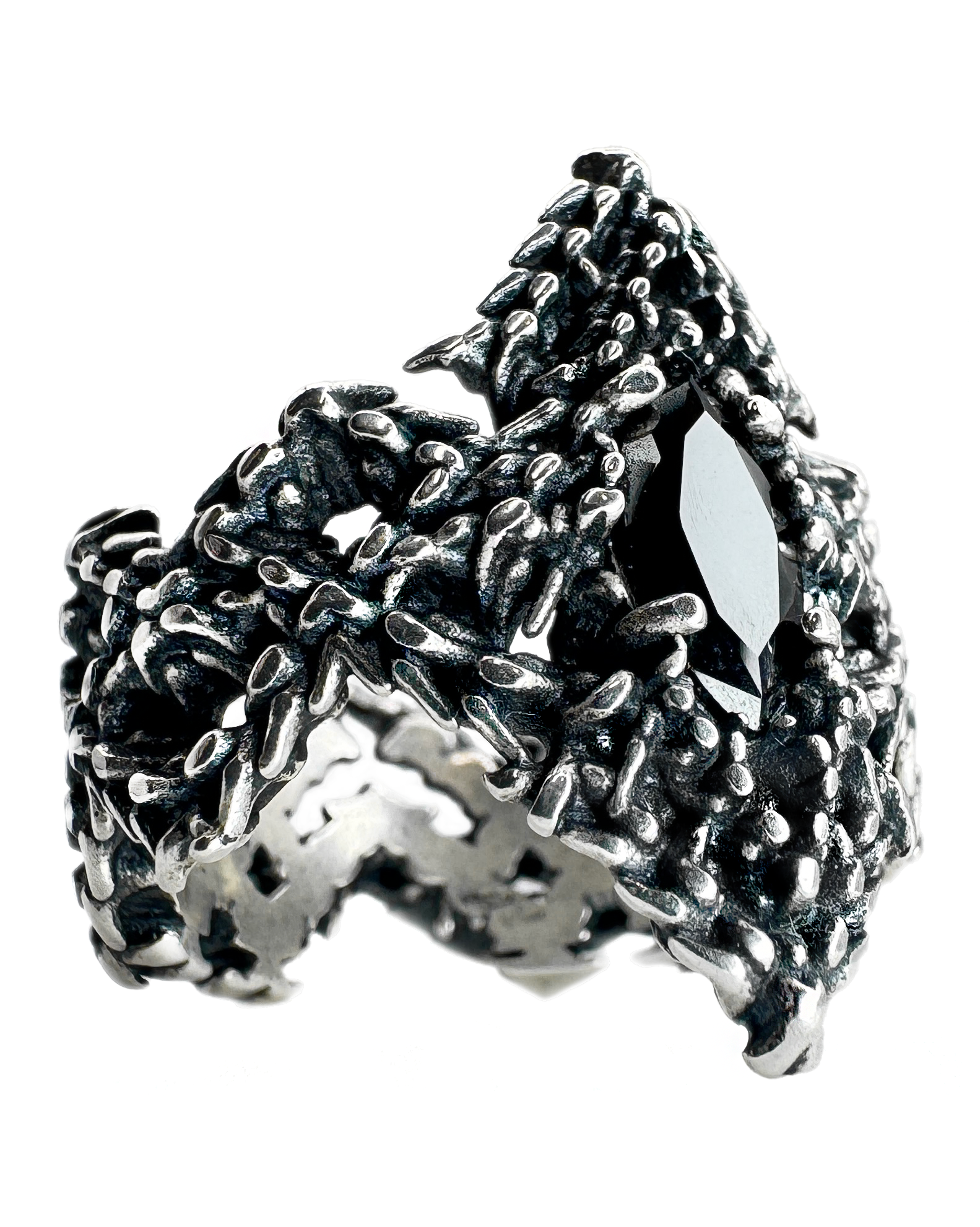 A sterling silver ring with a trident-shaped design, featuring a central black gemstone and intricate textures around the band.