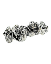 A sterling silver ring with a band designed to look like a rose, surrounded by a series of skull motifs.