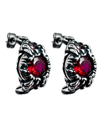 A pair of steel earrings with claw like prongs holding a ruby.